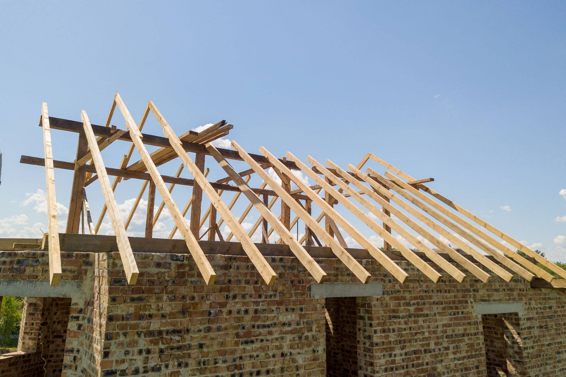 aerial-view-of-unfinished-house-with-wooden-roof-f-2023-11-27-05-32-27-utc